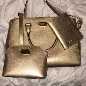 Beautiful gold Michael Kors satchel crossbody bag